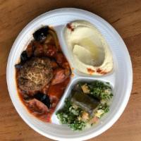 Vegan Sampler · Eggplant and zucchini stew, cauliflower dolma, hummus and tabbouleh. Served with pita. Vegan.