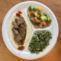 Gyro Over Hummus · Salad and tabbouleh. Served with pita and sauce side.