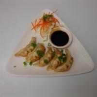 3. Pot Sticker Dumplings · Stuffed chicken and vegetables served with homemade sweet soy sauce.