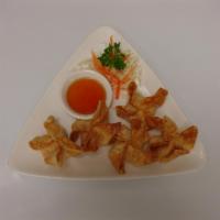 4. Crab Rangoon · 5 pieces. Stuffed with crab meat, cream cheese and celery. 