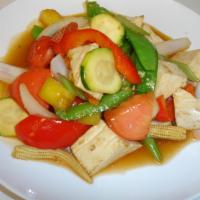 50. Pad Sweet and Sour · Sauteed pineapple, tomatoes, onion, carrot, snow pea, baby corn, zucchini bell pepper and ce...