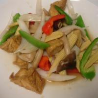 58. Pad Baby Corn and Mushroom · Sauteed mushroom, baby corn bell pepper and onion in oyster sauce with choice of meat. Serve...