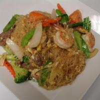 63. Pad Woon Sen · Stir-fried glass noodles with egg, broccoli, onion, carrot, bok choy , tomatoes, snow pea be...