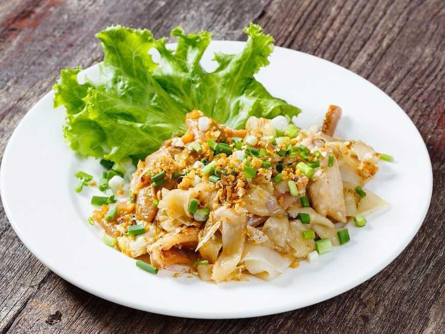 Kua Gai คั่วไก่ · Flat rice noodles sauteed with choice of meat, egg, lettuce and soy sauce.