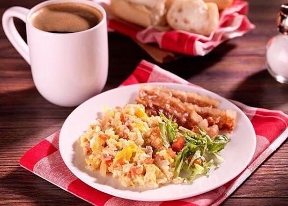 2 Eggs any Style · Onions and tomatoes and a baguette bread. Add and Arepa for an additional $1.00
