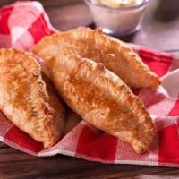 Empanada (Baked) Mushrooms & cheese · Baked puff pastry dough filled with mushrooms & cheese