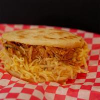 Arepa Catira · Arepa filled with Shredded chicken and Gouda cheese.