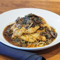 Marsala · Sauteed with fresh mushrooms in a Marsala wine sauce served over spaghetti.