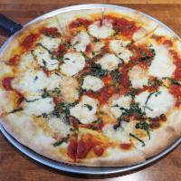 Margherita Pizza · Marinara sauce, fresh mozzarella and basil.