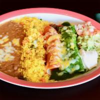 4. Beef and Chicken Enchilada · 2 enchiladas. beef and chicken mixed. Served with rice, refried beans, lettuce, pico de gall...