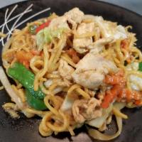 Lomein Noodle · Egg noodle stir-fried with red bell pepper, green bell pepper, carrot, cabbage, white onion ...