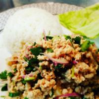 Lab Kai · Ground Chicken cooked with special sauce With green onion , cilantro , mint Rice , lectucell...