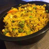 Special Royal Biryani · Basmati rice cooked with fresh vegetables, lamb, chicken and shrimp seasoned with fresh grou...