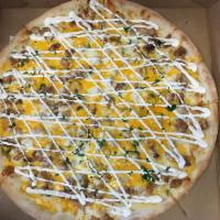 Chicken, Bacon and Ranch Pizza · A combination of fresh chicken, bacon and cheddar cheese with a drizzle of ranch dressing.