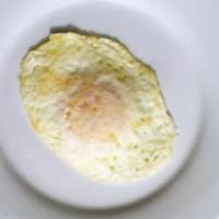 Huevos Fritos · Fried eggs. 