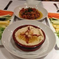 Hummus · Vegan and gluten free. With pita