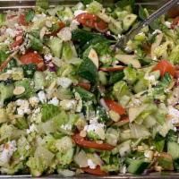 Bibi'z Chopped Salad · Romaine, parsley, mint, tomatoes, cucumbers, onions, toasted pita chips, fresh lemon and oli...