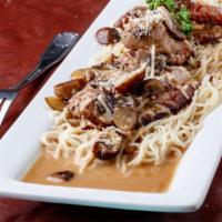 Veal Marsala · Angel hair pasta with tender veal cutlet, mushrooms and marsala wine.