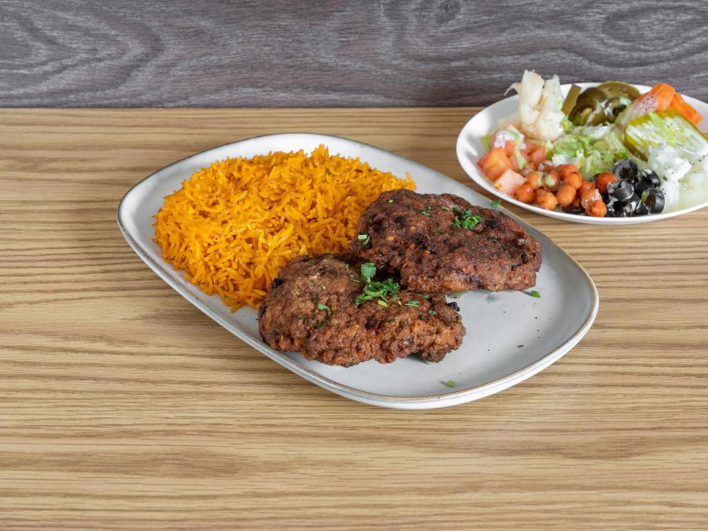 Chapli Kebab Platter · Platter includes 2 pieces of chapli kebab served over rice and completed with your choice of mixed salad toppings and our signature white sauce, green sauce and hot sauce. Complete you meal for an additional charge. 

