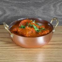 Chicken Tikka Masala Curry · Boneless pieces of chicken swimming in a creamy, tomato curry sauce. Add sides for an additi...