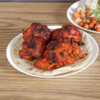 Chicken Tikka on Pita · Toppings, sauces available. Complete your meal for an additional charge. 