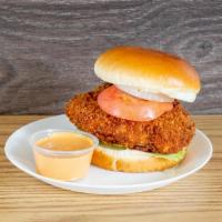 The Zinger Burger · Crispy chicken breast patty. Completed with lettuce, tomatoes, mayo and ketchup. Add fries a...