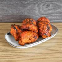 Chicken Tikka · 6 pieces of chicken tikka handsomely marinated in a unique mixture and cooked in our tandoor...