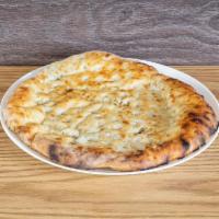 Keema Naan - Lamb · Ground lamb keema enclosed in a naan bread, baked in a tandoor oven. Couples well with mint ...