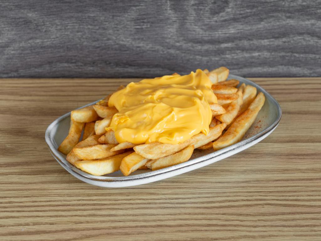Cheesy Fries · Plain french fries drizzled with melty cheese.

