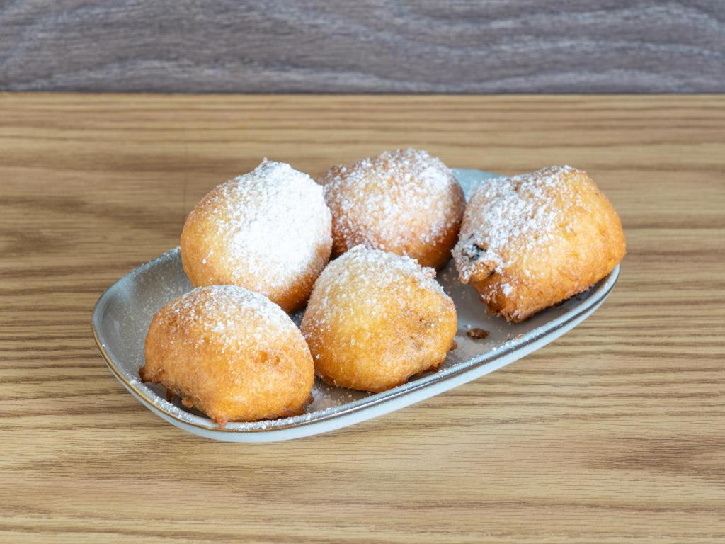 Ore-OHs · Fried OREOs! Pancake battered Oreo treats. Showered with powdered sugar and guarantee to make you OH!

