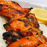 Chicken Jujeh Kabob · Cornish game hen marinated in lemon juice, saffron, onion, skewered and broiled over open fl...