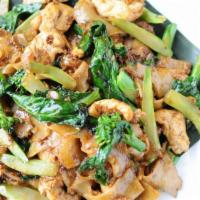 Pad See Ew · Stir-fried wide rice noodles with Chinese broccoli and egg in a sweet brown sauce.