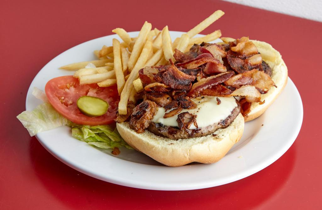Charlie's Double Mega Cheeseburger · Angus beef patties with American cheese, Sauteed mushrooms (& onions), lettuce, tomato and pickle topped with bacon. Served with your choice of side.