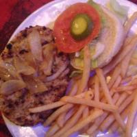 Veggieburger · Veggie burger with lettuce, tomato and pickle topped with grilled onions. Served with your c...