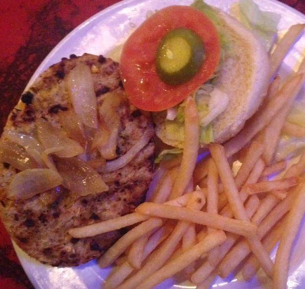 Veggieburger · Veggie burger with lettuce, tomato and pickle topped with grilled onions. Served with your choice of side.