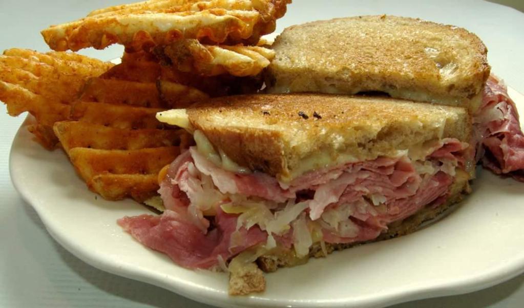 Rueben Sandwich · Corned beef with Russian dressing, sauerkraut and swiss cheese on your choice of bread. Served with your choice of side.