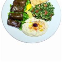 10. Veggie Plate · Grape leaves served with hummus, tabbuleh, lettuce and tomatoes. Vegetarian.