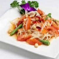 Som Tum (Papaya Salad) · Shredded green papaya mixed with Thai chili, carrot, tomato, green bean, garlic, lime juice ...