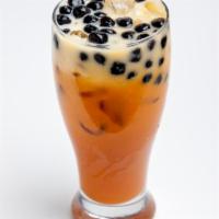 Thai Iced Tea · Strongly brewed Thai Ceylon tea with sugar and milk