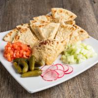 Hummus · Toasted pita bread, olive oil, cumin, cornichon pickles, cucumber, radish