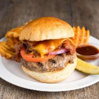 Whiskey Roadhouse Burger · Sauteed apples, caramelized onions, cheddar, bacon, bourbon sauce, Breadsmith buttertop bun,...