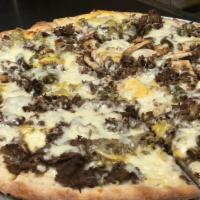 Philly Cheese Pizza · Philly steak with peppers, onions and mushrooms with American cheese.