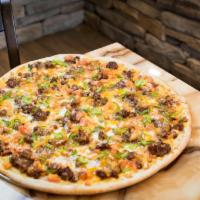 Taco Pizza · Ground beef, green peppers, cheddar and tomatoes.