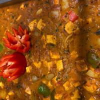Kadai Paneer · Paneer cooked with onions and peppers in a tomato base with chili and coriander seeds. Spicy...