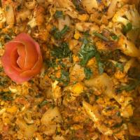 Aloo Gobhi · Fresh cauliflower and potatoes sauteed with ginger, garlic and onions. Gluten free and nut f...