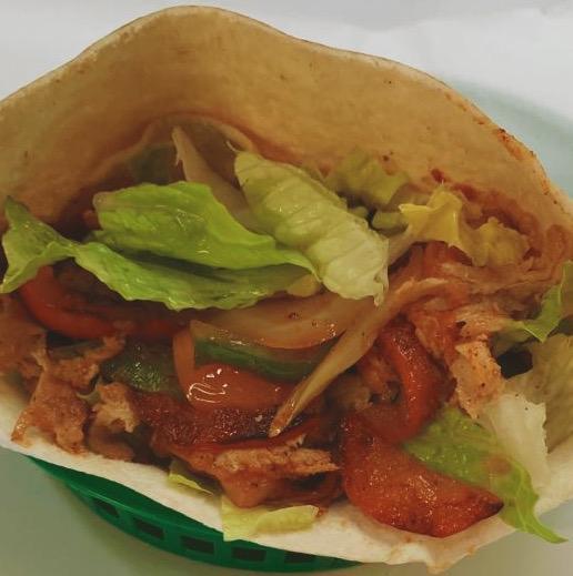 Pepper Steak · Thin sliced steak grilled with bell pepper, onions, tomatoes and special seasoning. Served in a pita bread.