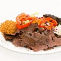 Doner · Freshly grounded beef and lamb turning grill. Gyro. Served with rice and mixed greens.