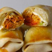 Chicken Egg Roll · Golden fried rice paper rolls stuffed with chicken, vegetable and glass noodle.