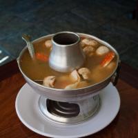 Tom Yum Soup · A choice of chicken, tofu, mix vegetable, hot and sour lemongrass broth with chicken and mus...