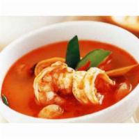 Tom Yum Seafood Soup · Spicy and sour lemongrass broth with shrimp, mussel, squid, fish fillet and mushrooms.